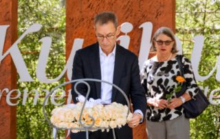 Pfizer Chairman and CEO Albert Bourla lays wreath at the Kigali Genocide Memorial