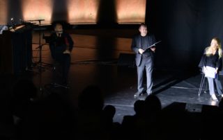 International lawyer Philippe Sands - 2nd from right - on stage at the Kigali Genocide Memorial during East West Street play